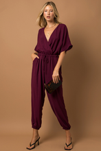 Load image into Gallery viewer, Dolman Sleeve Surplice Jumpsuit