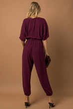 Load image into Gallery viewer, Dolman Sleeve Surplice Jumpsuit