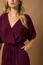 Load image into Gallery viewer, Dolman Sleeve Surplice Jumpsuit